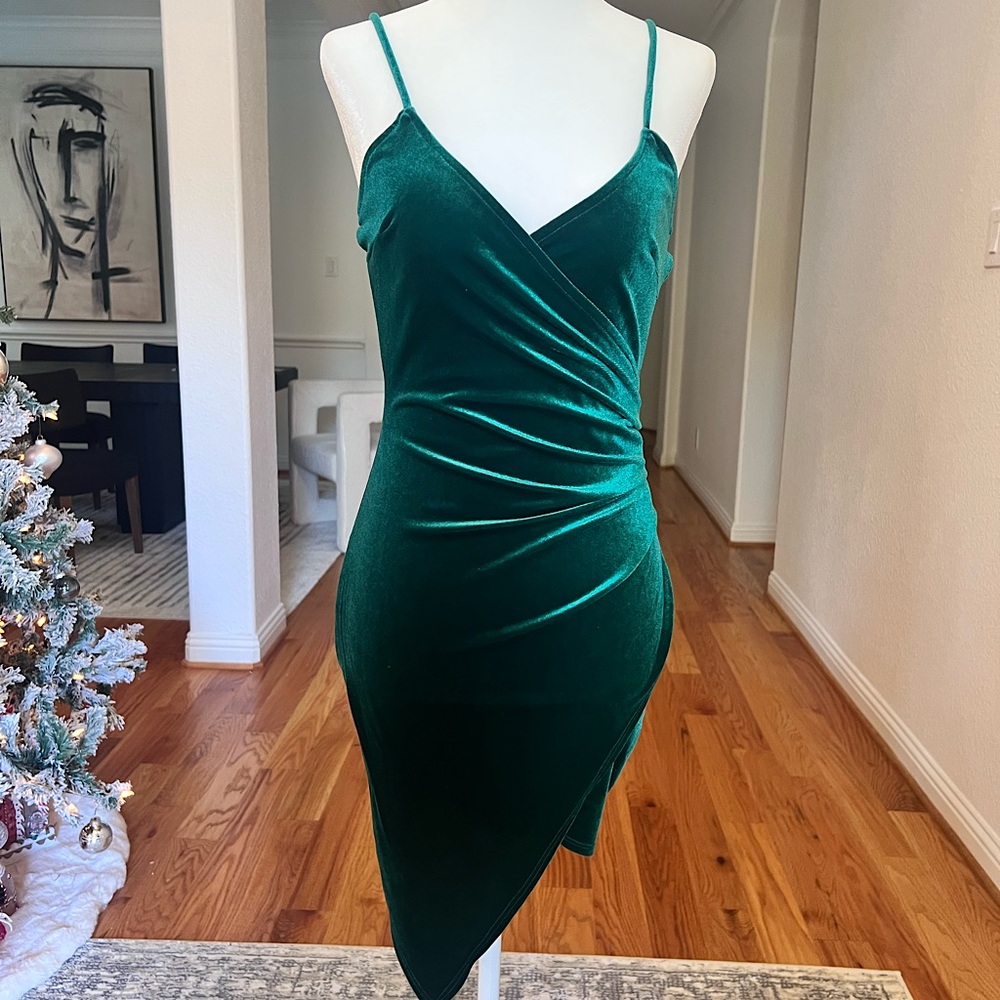 Emerald green velvet dress in size small.  Never worn.